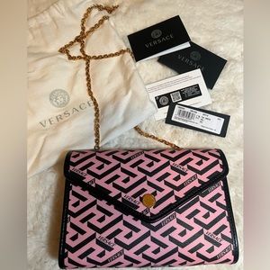 Authentic black and pink Versace La Greca Crossbody bag
